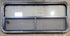 Used Black Radius Opening Window : 47 1/4" W x 21 1/4" H x 1 7/8" - Young Farts RV Parts