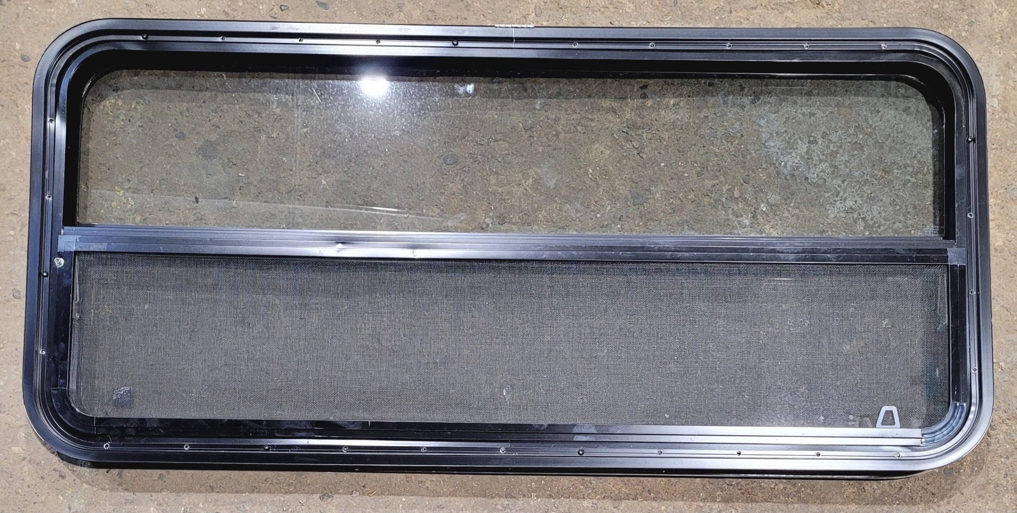 Used Black Radius Opening Window : 47 1/4" W x 21 1/4" H x 1 7/8" - Young Farts RV Parts