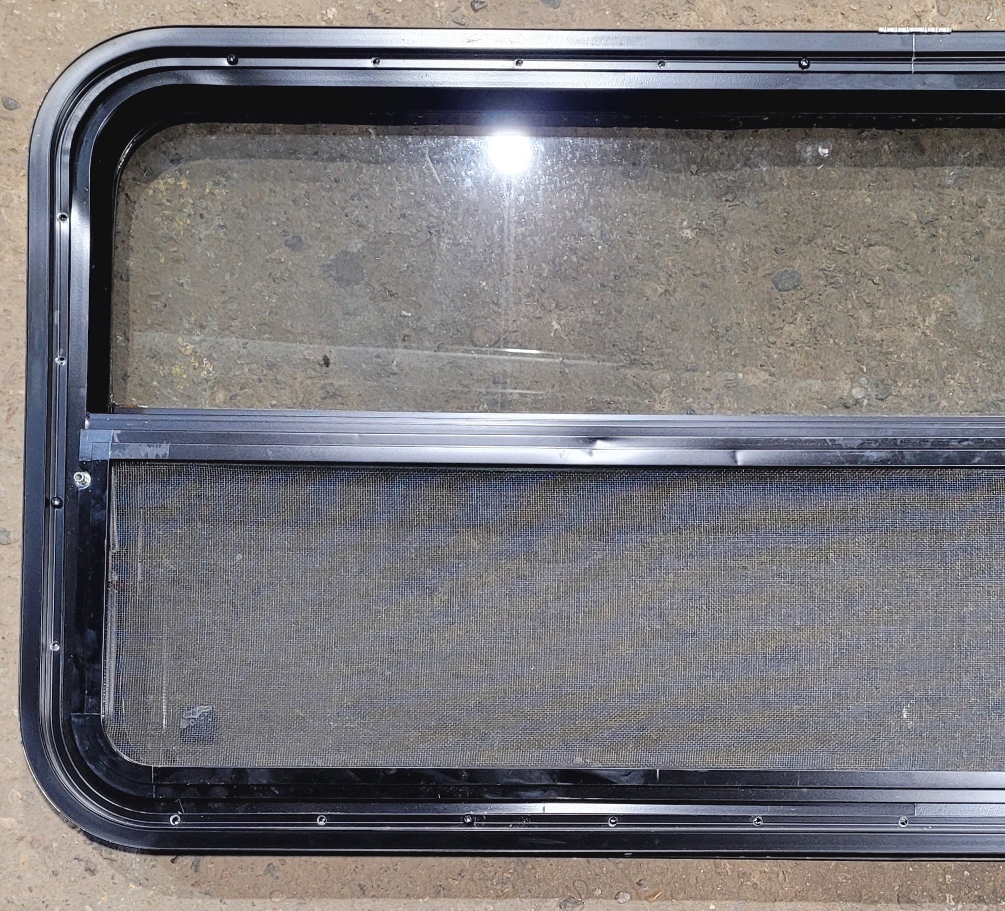 Used Black Radius Opening Window : 47 1/4" W x 21 1/4" H x 1 7/8" - Young Farts RV Parts