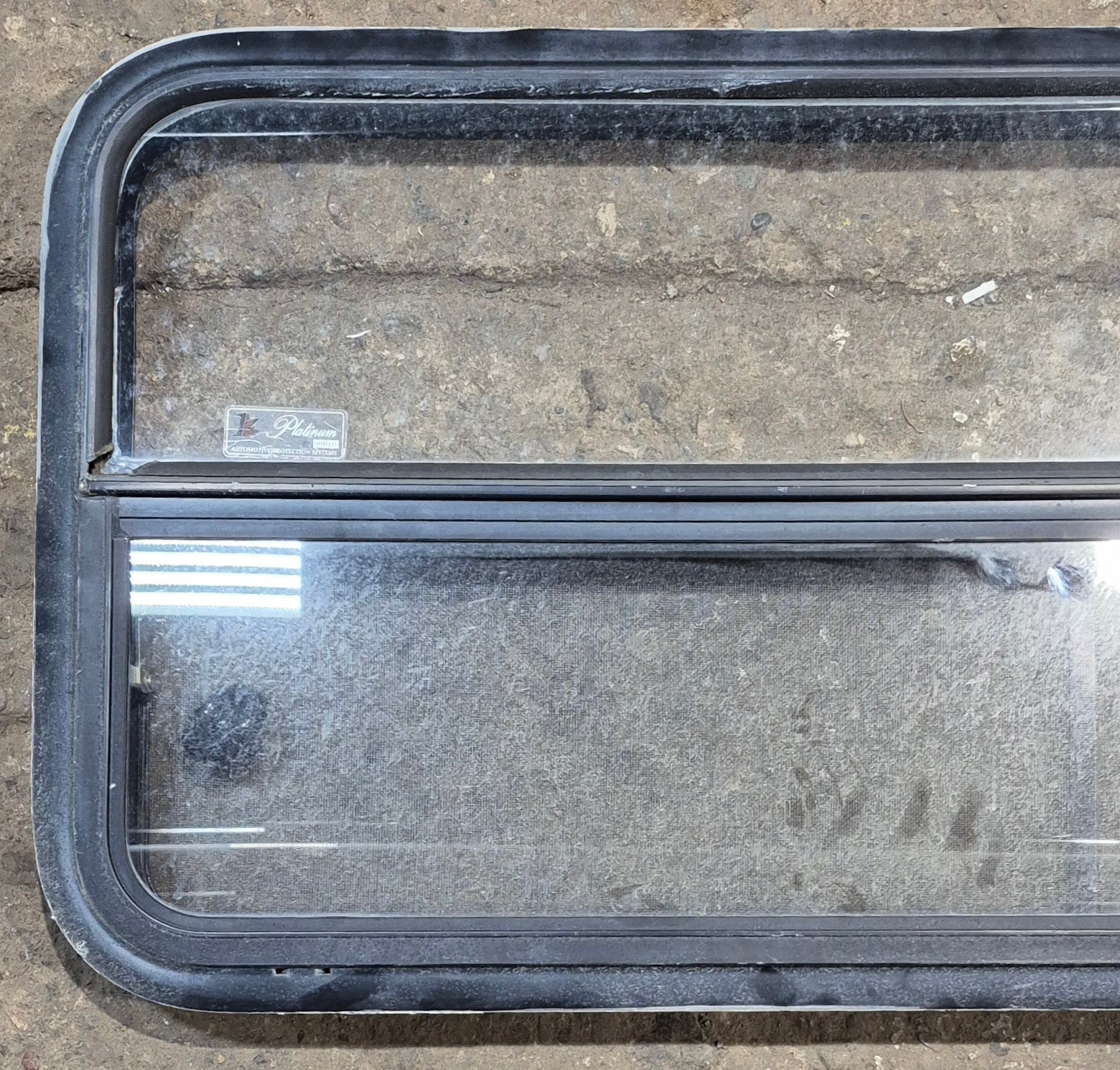 Used Black Radius Opening Window : 47 1/4" W x 21 1/4" H x 1 7/8" - Young Farts RV Parts