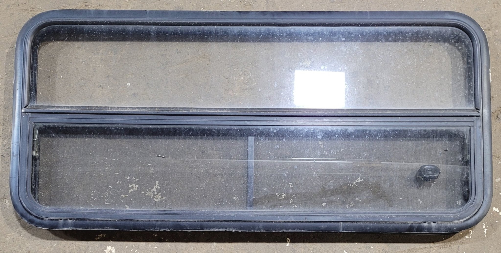 Used Black Radius Opening Window : 47 1/4" W x 21 1/4" H x 1 7/8" - Young Farts RV Parts