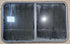 Used Black Radius Opening Window : 47 1/4" W x 28 1/4" H x 1 1/4" - Young Farts RV Parts