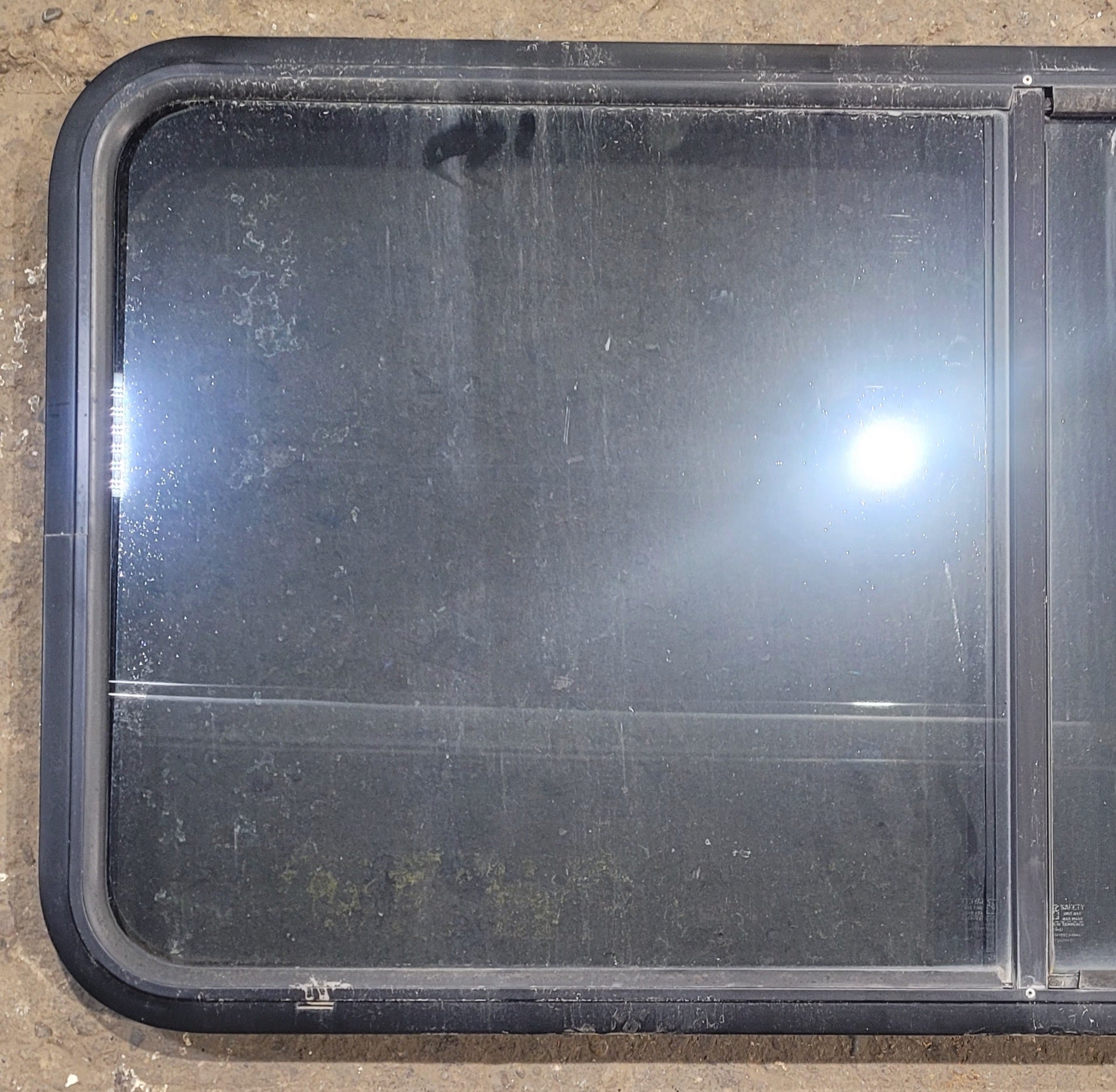 Used Black Radius Opening Window : 47 3/4" W x 23 3/4" H x 1 3/4" - Young Farts RV Parts