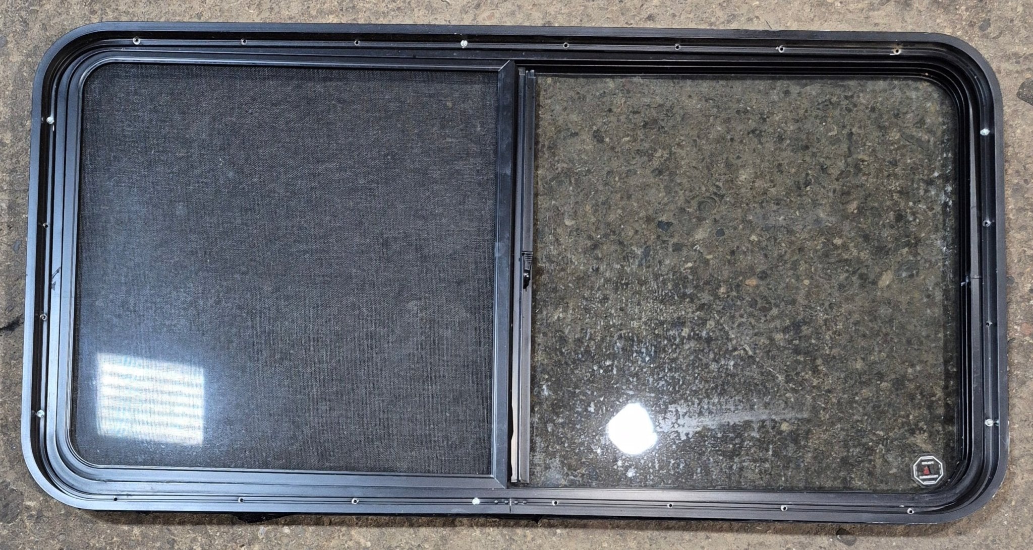 Used Black Radius Opening Window : 47 3/4" W x 23 3/4" H x 1 7/8" - Young Farts RV Parts