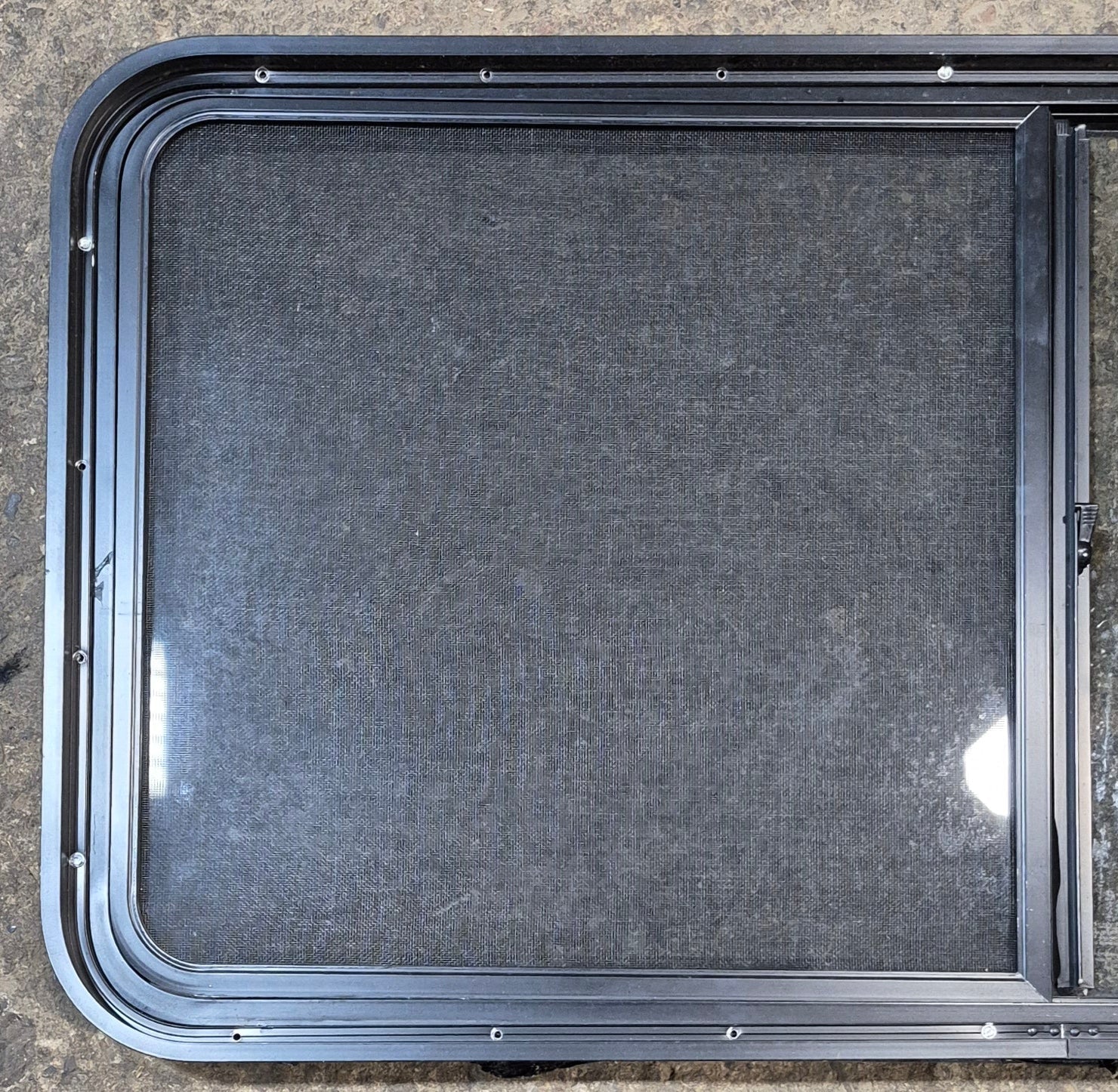 Used Black Radius Opening Window : 47 3/4" W x 23 3/4" H x 1 7/8" - Young Farts RV Parts