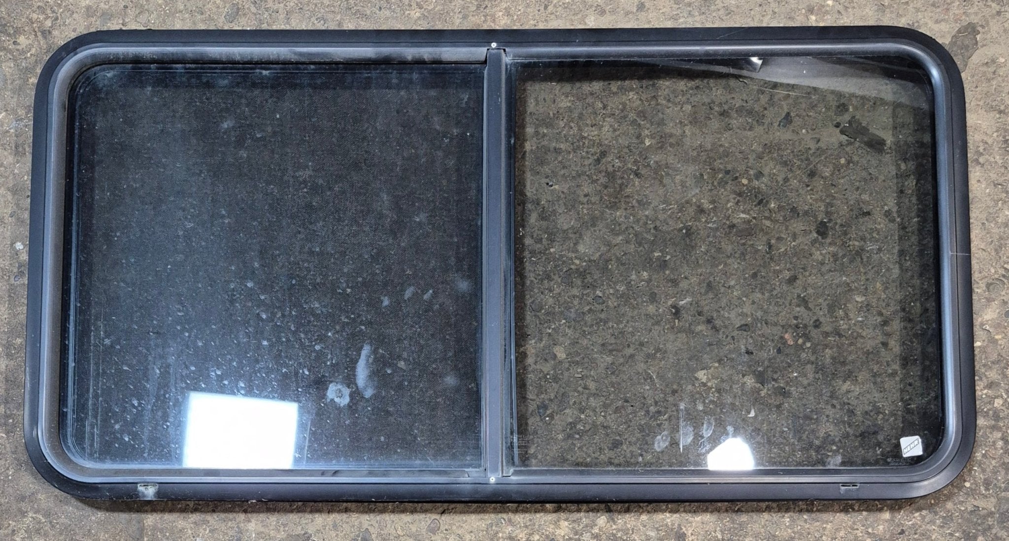 Used Black Radius Opening Window : 47 3/4" W x 23 3/4" H x 1 7/8" - Young Farts RV Parts