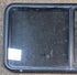 Used Black Radius Opening Window : 47 3/4" W x 23 3/4" H x 1 7/8" - Young Farts RV Parts