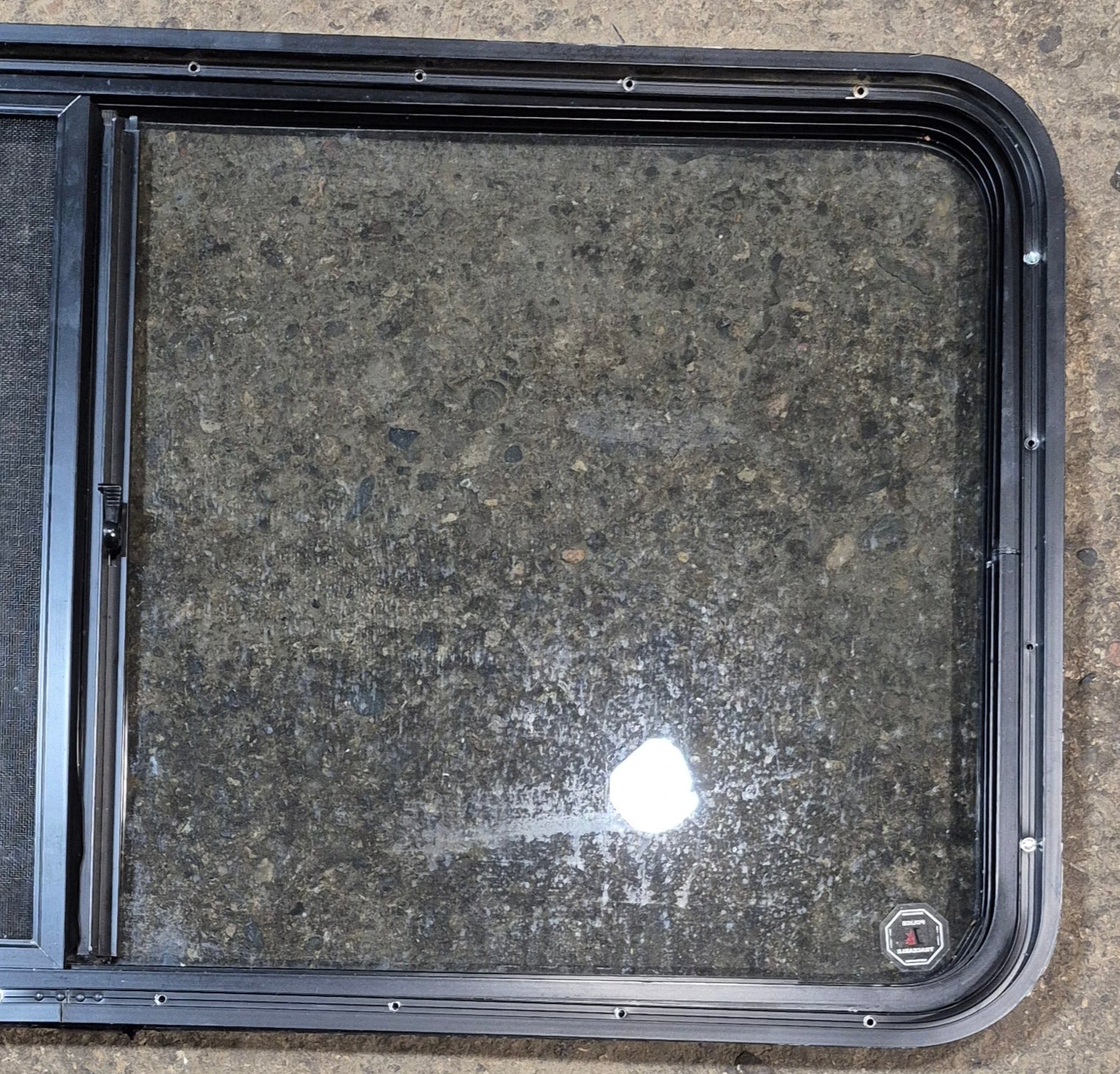 Used Black Radius Opening Window : 47 3/4" W x 23 3/4" H x 1 7/8" - Young Farts RV Parts