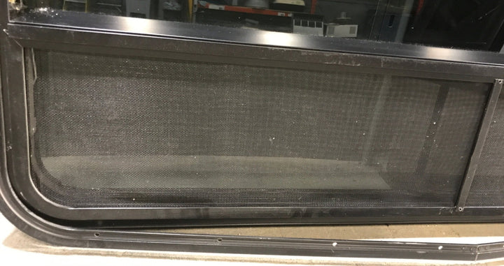 Used Black Radius Opening Window : 47 3/4" W x 34 3/4" H x 2" D - Young Farts RV Parts