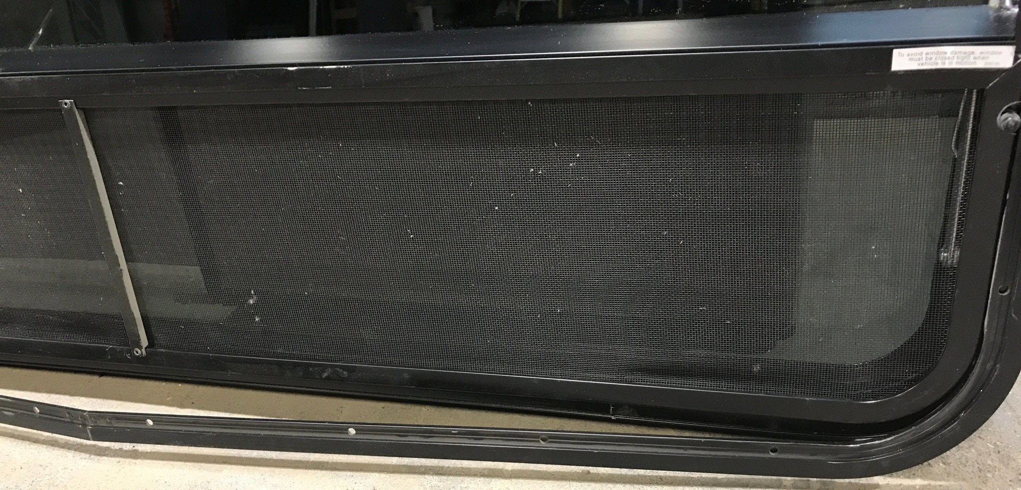 Used Black Radius Opening Window : 47 3/4" W x 34 3/4" H x 2" D - Young Farts RV Parts