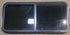 Used Black Radius Opening Window : 47" W x 21 1/2" H x 1 7/8" D - Young Farts RV Parts