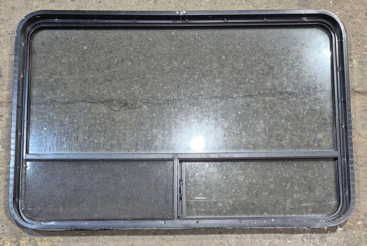 Used Black Radius Opening Window : 48 1/4" W x 31 3/4" H x 1 7/8" - Young Farts RV Parts