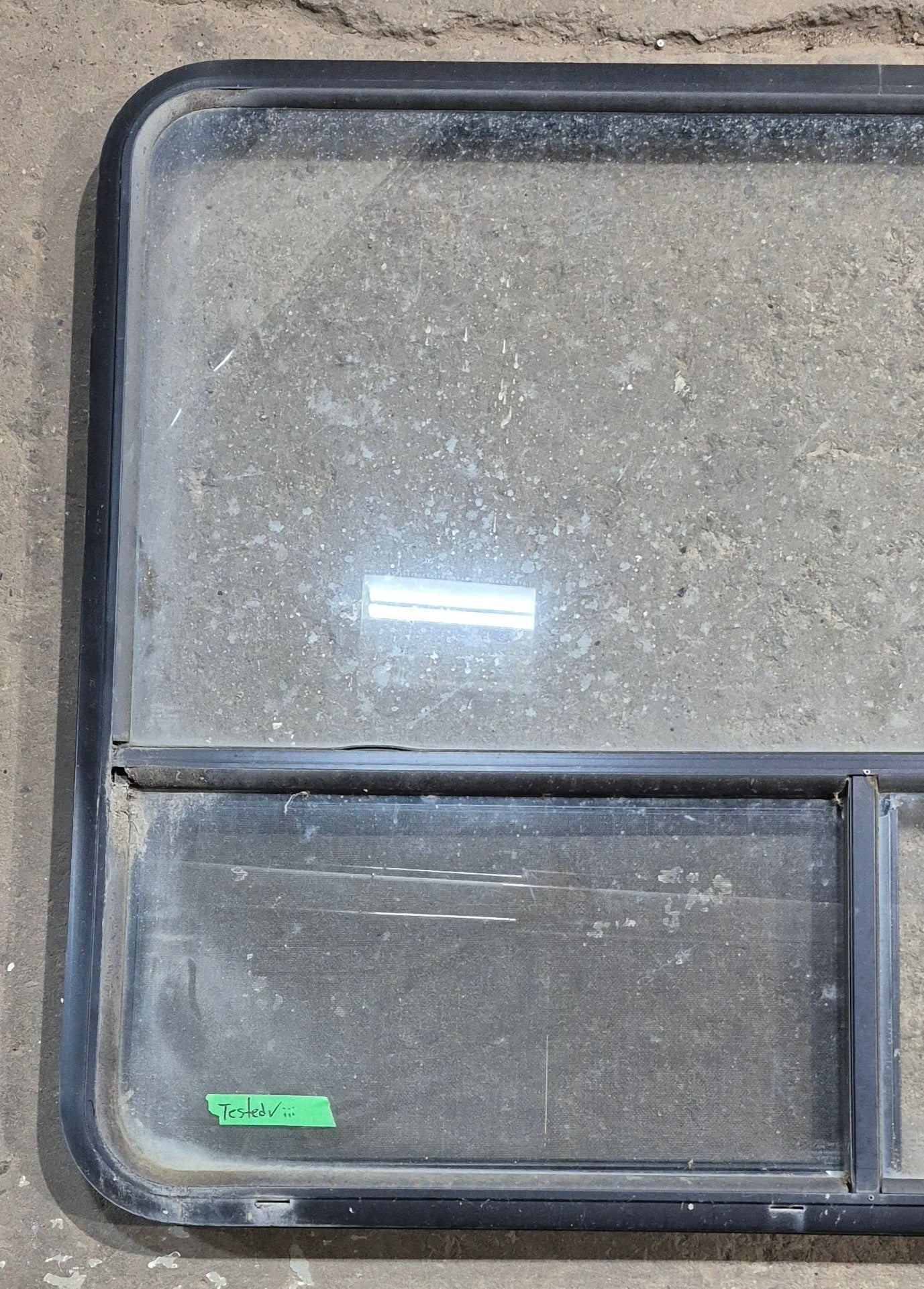 Used Black Radius Opening Window : 48 1/4" W x 35 3/4" H x 1 5/8" D - Young Farts RV Parts