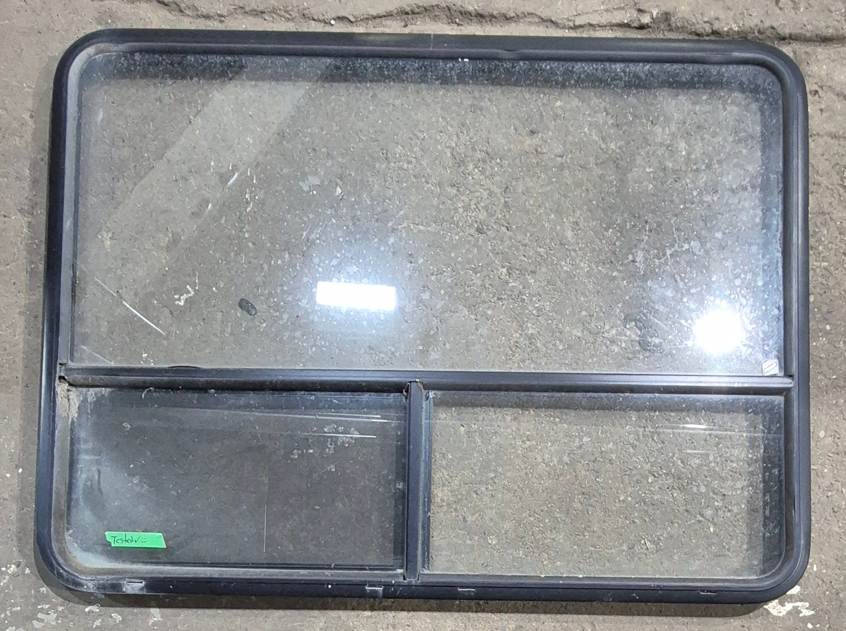 Used Black Radius Opening Window : 48 1/4" W x 35 3/4" H x 1 5/8" D - Young Farts RV Parts
