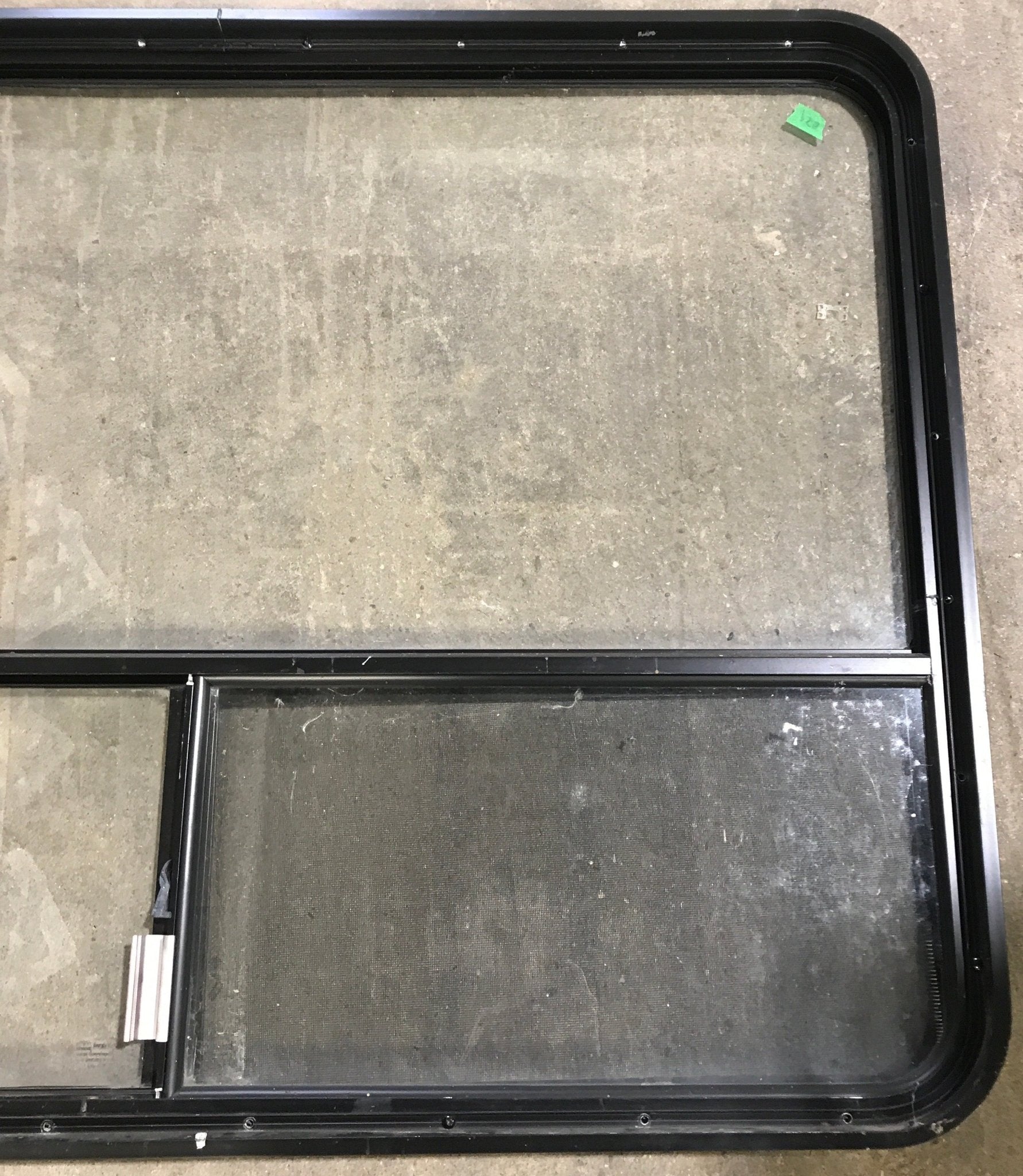 Used Black Radius Opening Window : 48 1/4" W x 35 3/4" H x 1 7/8" D - Young Farts RV Parts