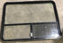 Used Black Radius Opening Window : 48 1/4" W x 35 3/4" H x 1 7/8" D - Young Farts RV Parts