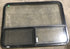 Used Black Radius Opening Window : 48 1/4" W x 35 3/4" H x 1 7/8" D - Young Farts RV Parts