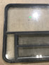 Used Black Radius Opening Window : 48" W x 34 1/2" H x 2" D - Young Farts RV Parts