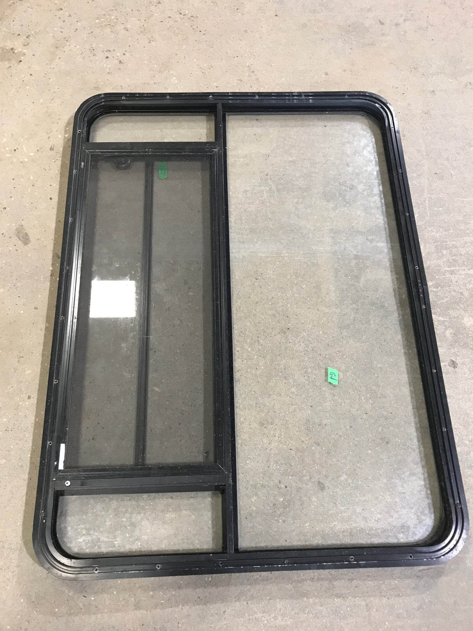 Used Black Radius Opening Window : 48" W x 34 1/2" H x 2" D - Young Farts RV Parts