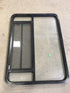 Used Black Radius Opening Window : 48" W x 34 1/2" H x 2" D - Young Farts RV Parts