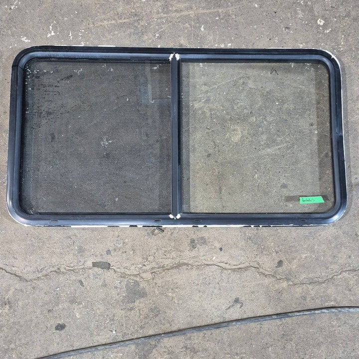Used Black Radius Opening Window - 48.25 X 25.75 X 1.75 - Young Farts RV Parts