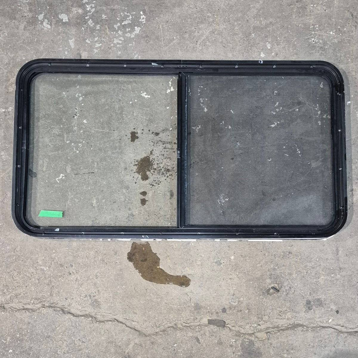 Used Black Radius Opening Window - 48.25 X 25.75 X 1.75 - Young Farts RV Parts