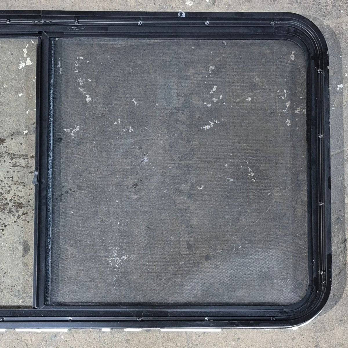 Used Black Radius Opening Window - 48.25 X 25.75 X 1.75 - Young Farts RV Parts