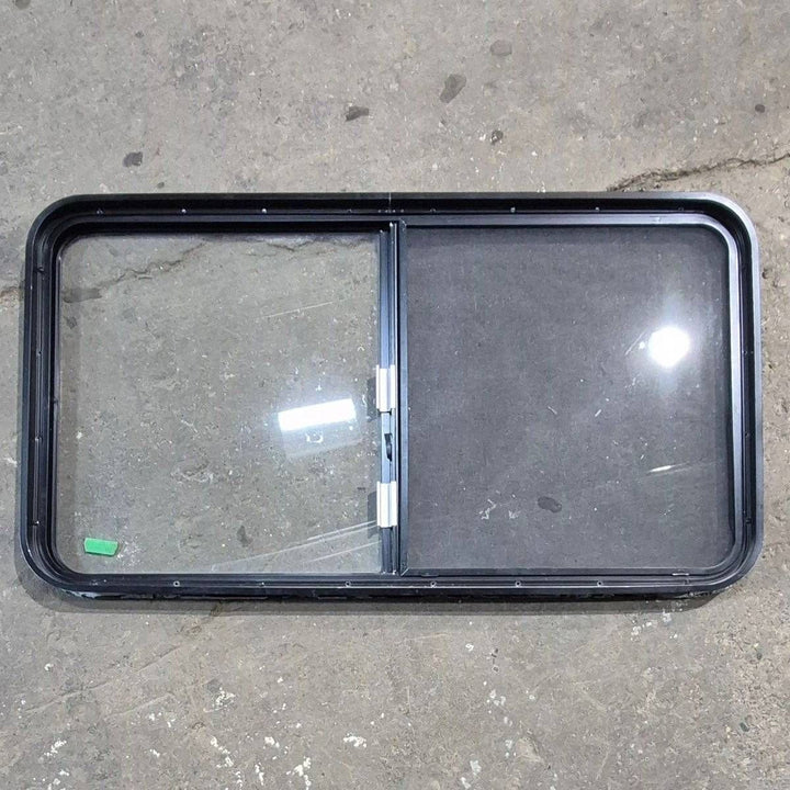 Used Black Radius Opening Window - 48.25 X 25.75 X 1.75 - Young Farts RV Parts