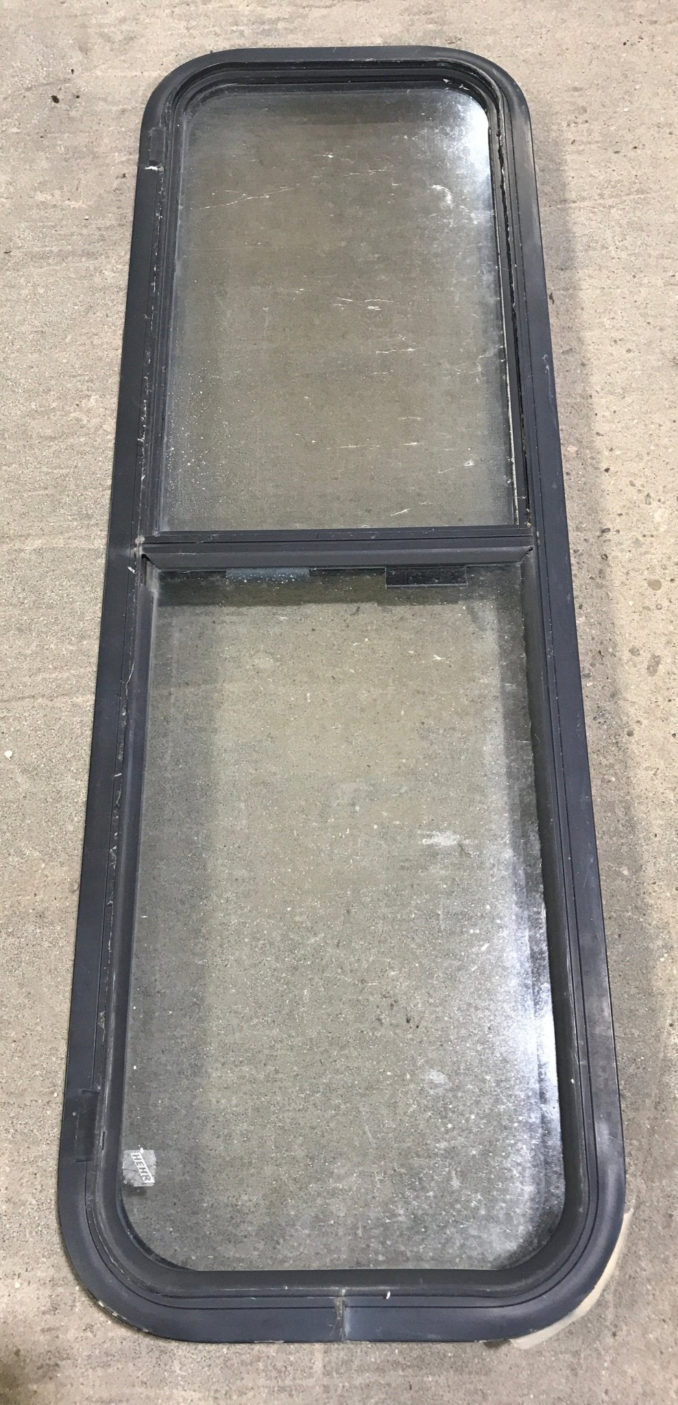 Used Black Radius Opening Window : 49" W x 15 1/4" H x 2" D - Young Farts RV Parts