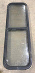 Used Black Radius Opening Window : 49" W x 15 1/4" H x 2" D - Young Farts RV Parts