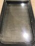 Used Black Radius Opening Window : 49" W x 15 1/4" H x 2" D - Young Farts RV Parts