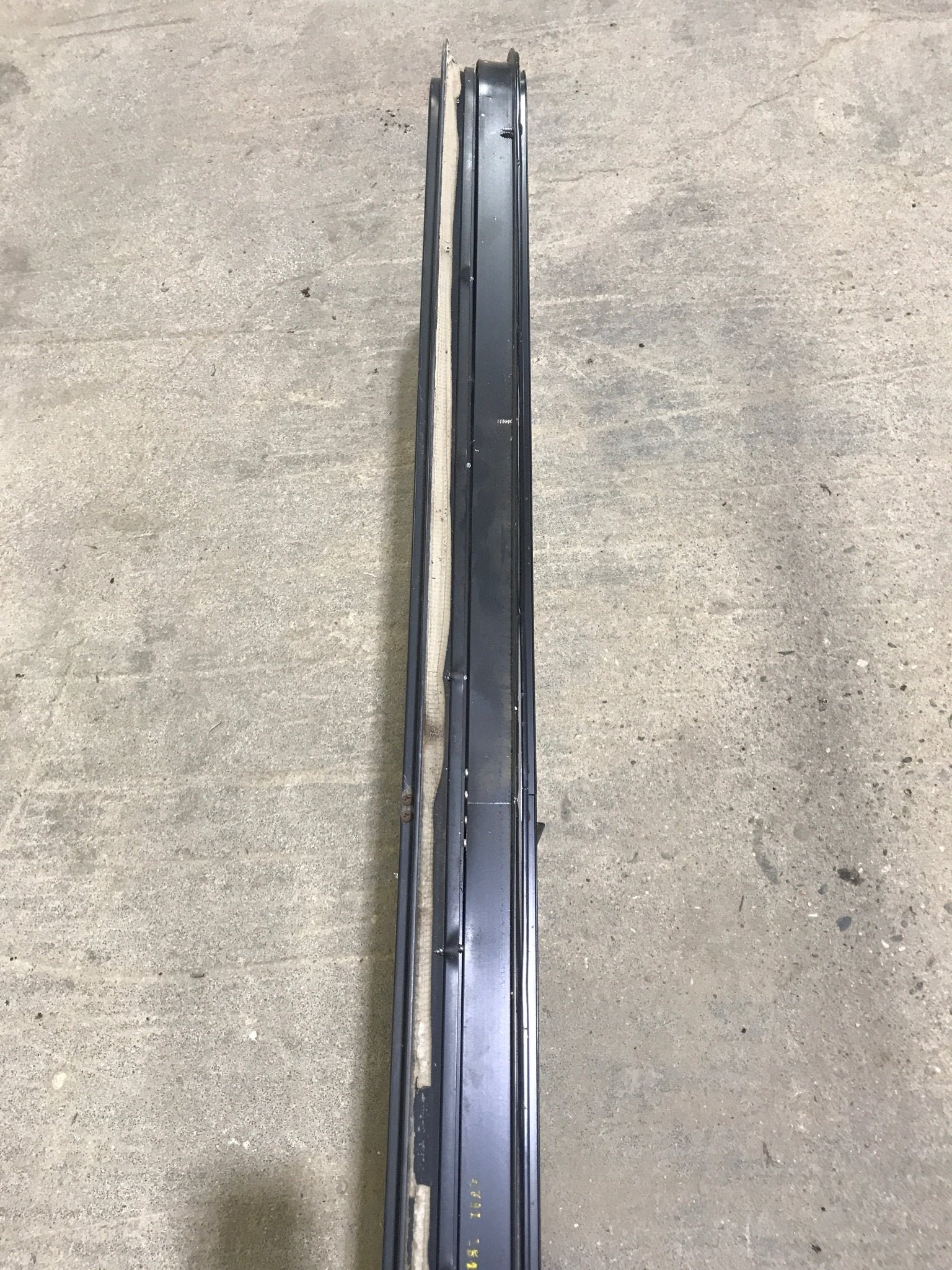 Used Black Radius Opening Window : 49" W x 15 1/4" H x 2" D - Young Farts RV Parts