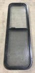 Used Black Radius Opening Window : 49" W x 15 1/4" H x 2" D - Young Farts RV Parts
