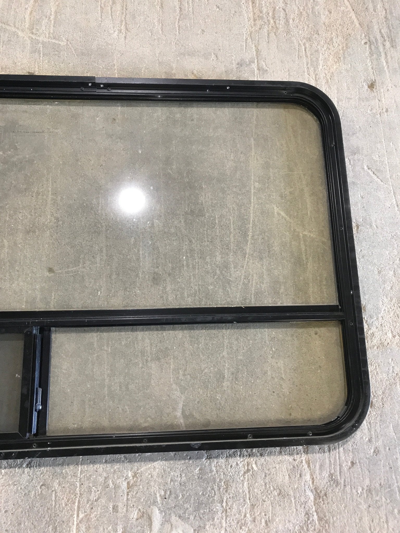 Used Black Radius Opening Window : 50 x 29 3/4 x 1 1/2