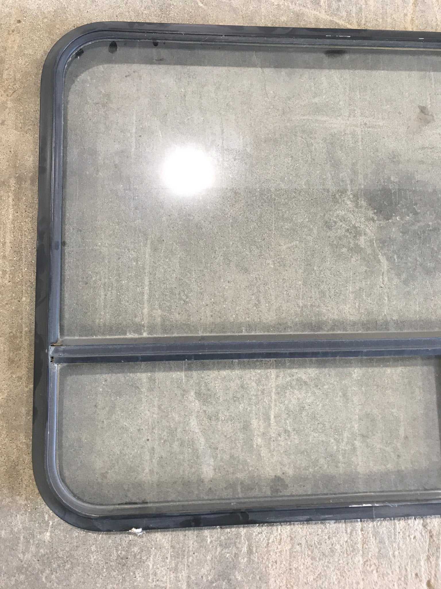 Used Black Radius Opening Window : 50 x 29 3/4 x 1 1/2" D - Young Farts RV Parts