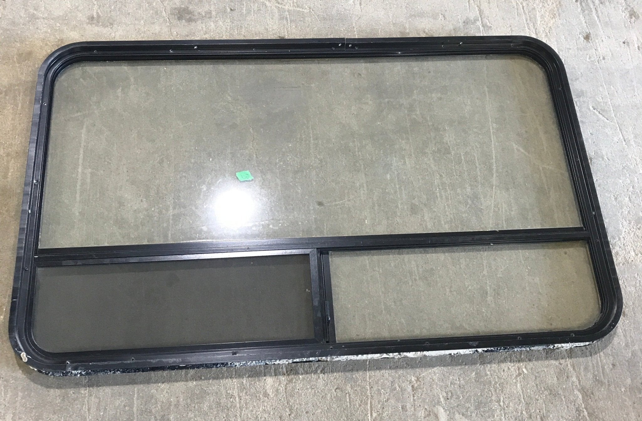 Used Black Radius Opening Window : 50 x 29 3/4 x 1 1/2" D - Young Farts RV Parts
