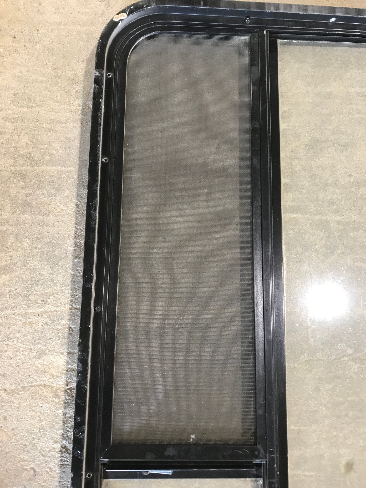 Used Black Radius Opening Window : 50 x 29 3/4 x 1 1/2