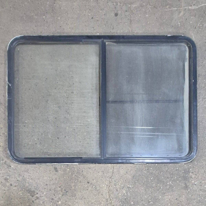Used Black Radius Opening Window - 53 1/2" X 35 1/2" X 1 1/4" - Young Farts RV Parts