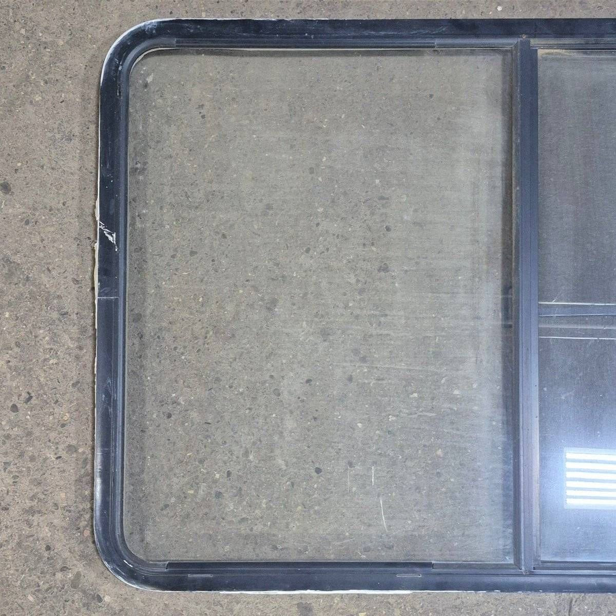 Used Black Radius Opening Window - 53 1/2