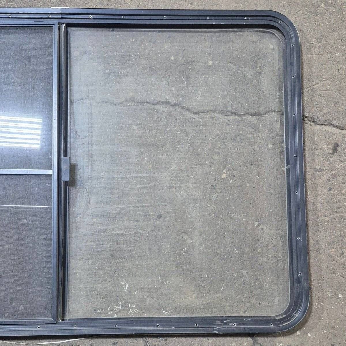Used Black Radius Opening Window - 53 1/2