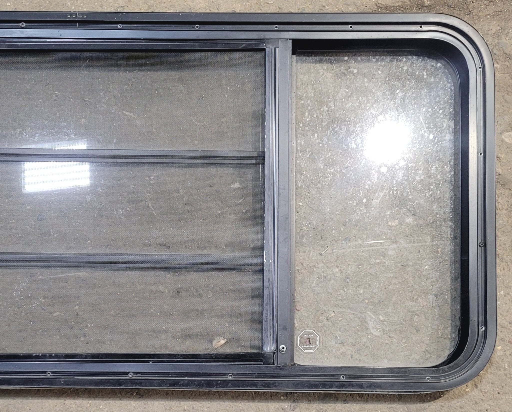 Used Black Radius Opening Window : 53 1/4" W x 22 1/4" H x 1 7/8" - Young Farts RV Parts