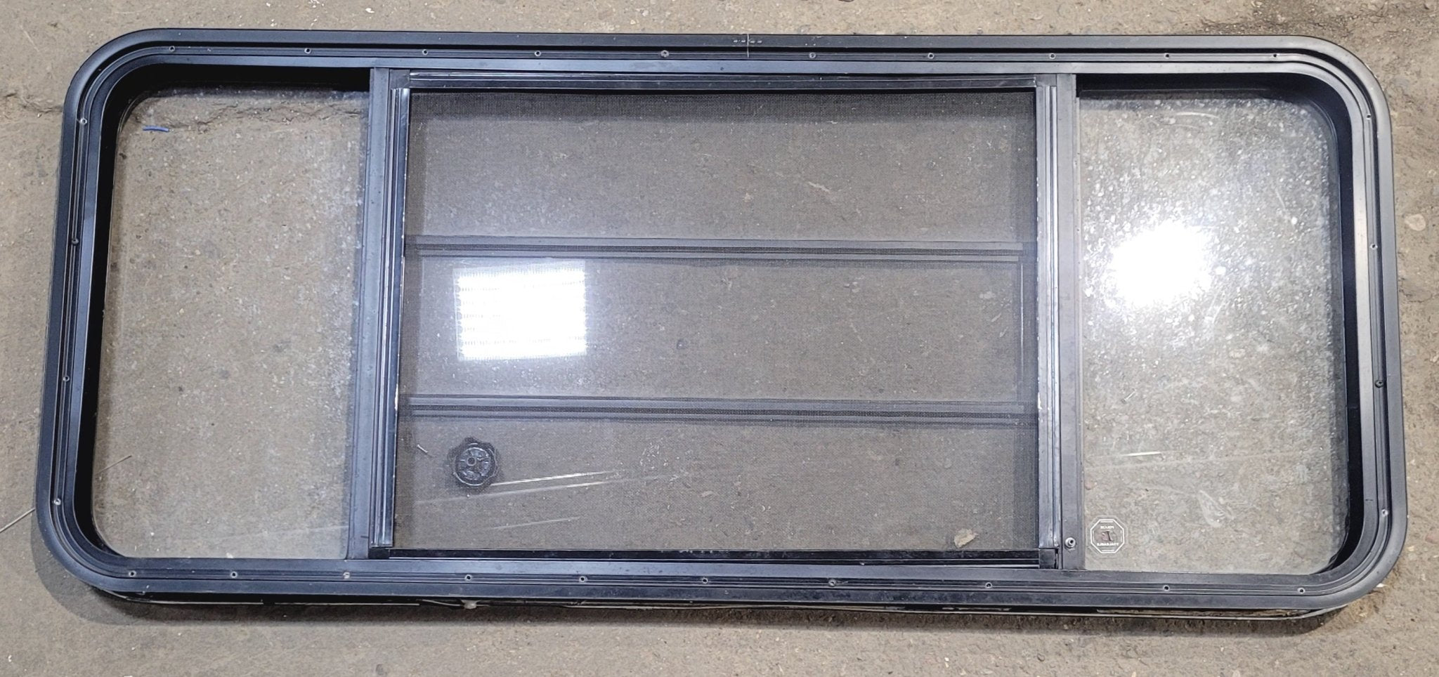 Used Black Radius Opening Window : 53 1/4" W x 22 1/4" H x 1 7/8" - Young Farts RV Parts