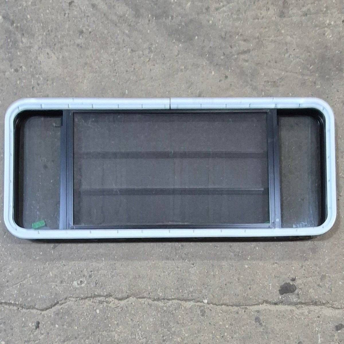 Used Black Radius Opening Window - 53 1/8" X 21 1/4" X 1 7/8" - Young Farts RV Parts