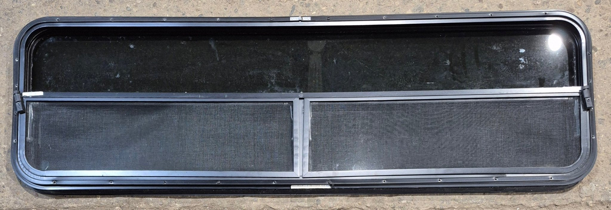 Used Black Radius Opening Window : 59 1/2" W x 17 1/4" H x 1 1/4" - Young Farts RV Parts