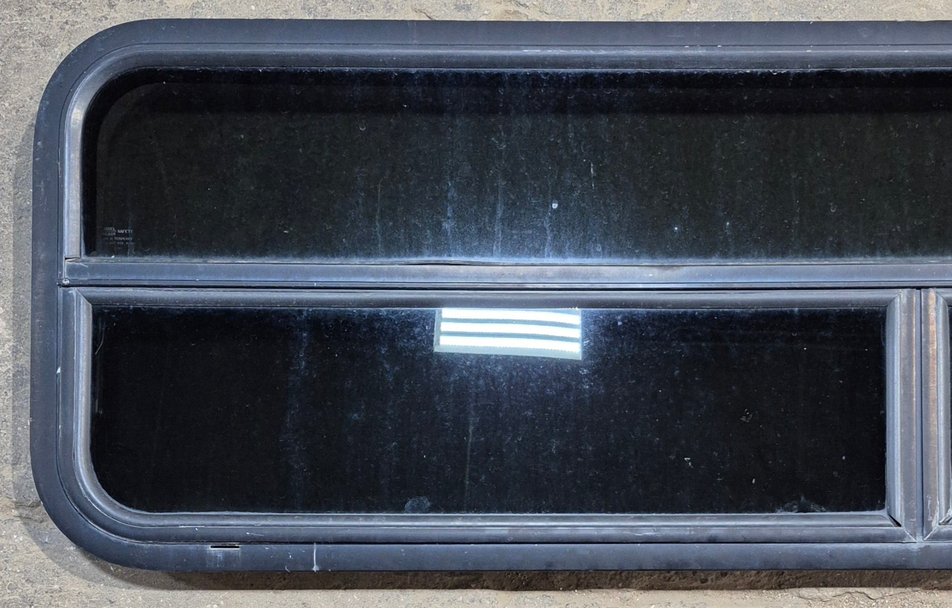 Used Black Radius Opening Window : 59 1/2" W x 17 1/4" H x 1 1/4" - Young Farts RV Parts