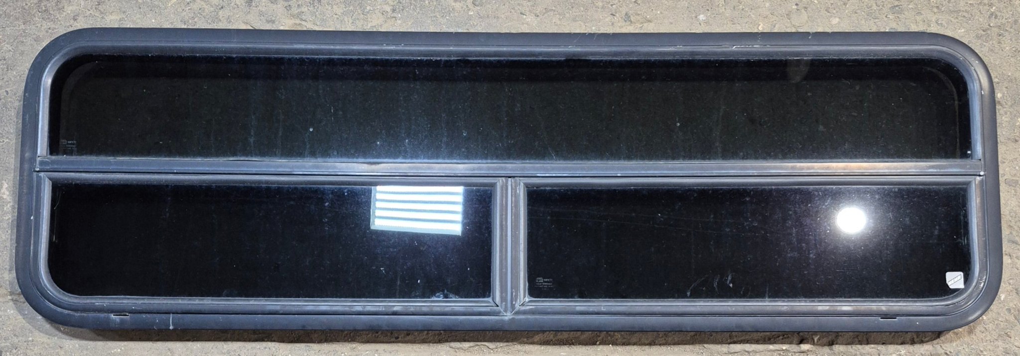 Used Black Radius Opening Window : 59 1/2" W x 17 1/4" H x 1 1/4" - Young Farts RV Parts
