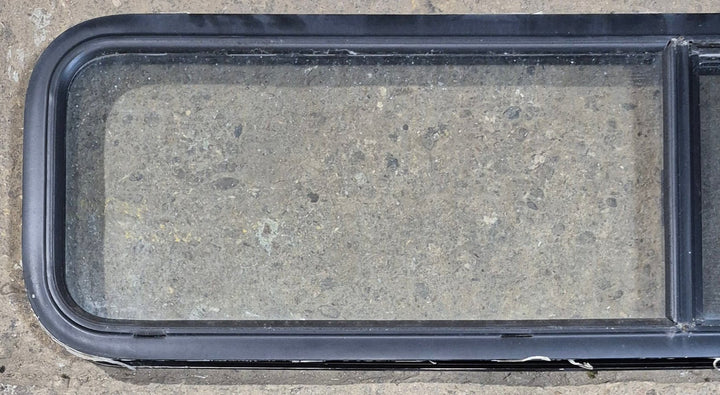 Used Black Radius Opening Window : 59 1/4" W x 14 1/4" H x 1 3/4" - Young Farts RV Parts