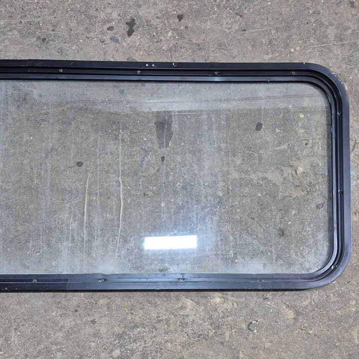 Used Black Radius Opening Window - 59.5 X 21.5 X 1.375 - Young Farts RV Parts