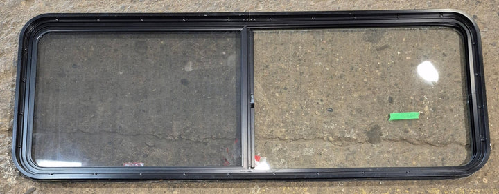 Used Black Radius Opening Window : 60 1/4" W x 21 3/4" H x 1 3/4" - Young Farts RV Parts