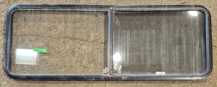 Used Black Radius Opening Window : 60 1/4" W x 21 3/4" H x 1 3/4" - Young Farts RV Parts
